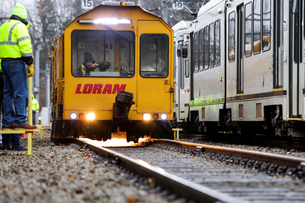 A photo of the rail grinding machine on the tracks in 2024.